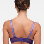 Model wearing Chantelle Day to Night Half Cup Bra in Veronica purple with demi shape, refined Lycra lace, and adjustable straps for a lifted look. back view