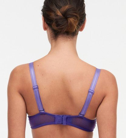 Model wearing Chantelle Day to Night Half Cup Bra in Veronica purple with demi shape, refined Lycra lace, and adjustable straps for a lifted look. back view