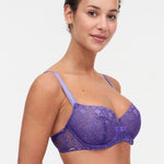 Model wearing Chantelle Day to Night Half Cup Bra in Veronica purple with demi shape, refined Lycra lace, and adjustable straps for a lifted look. side view