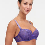 Model wearing Chantelle Day to Night Half Cup Bra in Veronica purple with demi shape, refined Lycra lace, and adjustable straps for a lifted look. side view