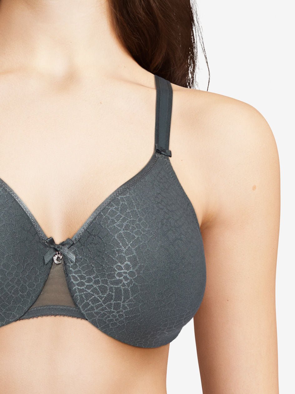 Model wearing the Chantelle C Magnifique Moulded Bra in Slate Grey from The Foundation, featuring full-coverage cups and smoothing back band. close up view