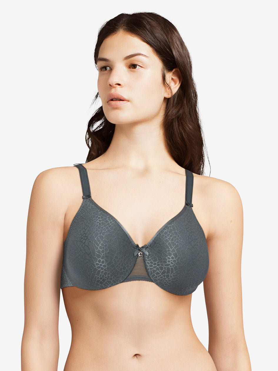 Model wearing the Chantelle C Magnifique Moulded Bra in Slate Grey from The Foundation, featuring full-coverage cups and smoothing back band.