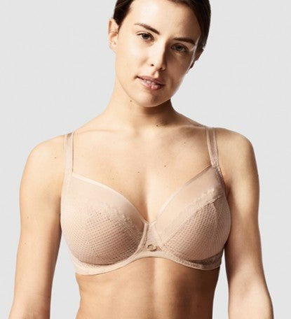 Model in Chantelle Parisian Allure Covering Bra in Nude from The Foundation, showing semi-sheer cups, low plunge, and racerback-friendly straps.