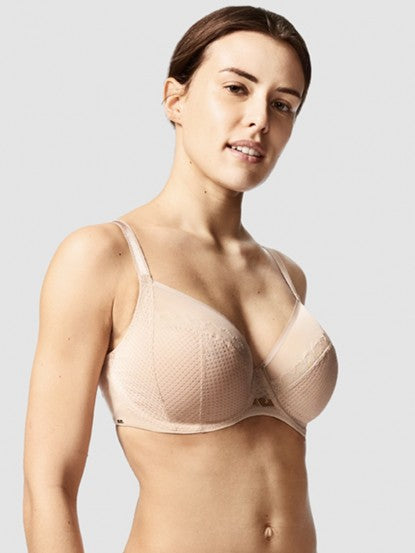 Model in Chantelle Parisian Allure Covering Bra in Nude from The Foundation, showing semi-sheer cups, low plunge, and racerback-friendly straps. side view
