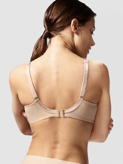 Model in Chantelle Parisian Allure Covering Bra in Nude from The Foundation, showing semi-sheer cups, low plunge, and racerback-friendly straps. back view