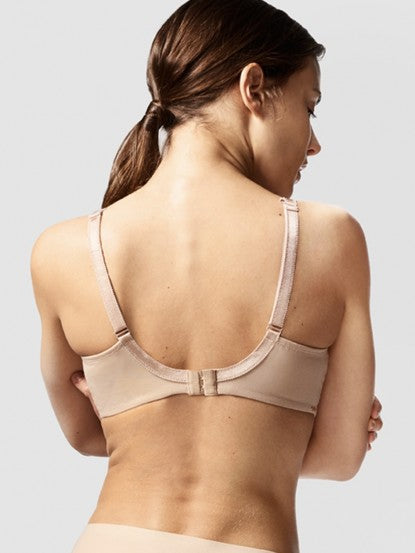 Model in Chantelle Parisian Allure Covering Bra in Nude from The Foundation, showing semi-sheer cups, low plunge, and racerback-friendly straps. back view