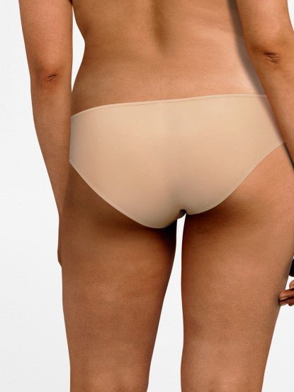 Back view of Chantelle Parisian Allure Brief in Nude with a seamless back design for invisible comfort under clothing.