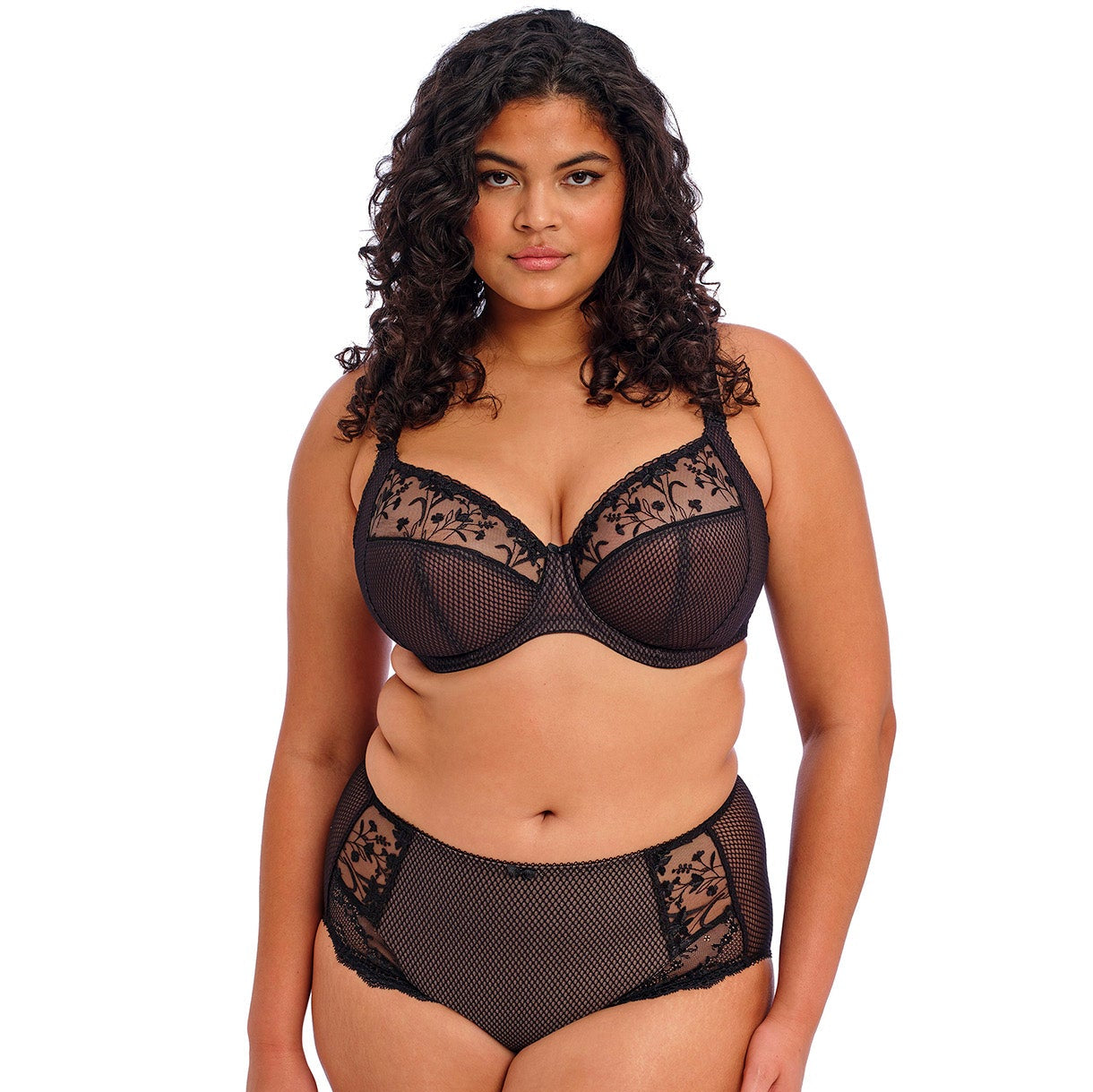 Plus-size model wearing the Elomi Charley Underwire Plunge Bra Jet Black, showing full cup fit and delicate stretch lace design.
