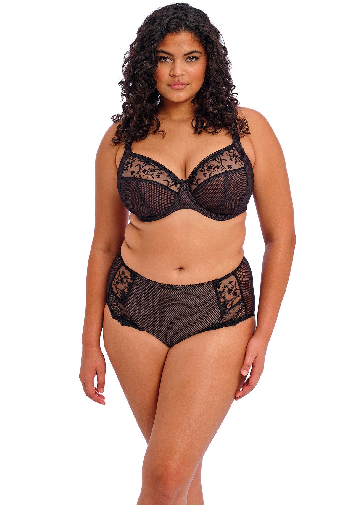 Plus-size model wearing the Elomi Charley Underwire Plunge Bra Jet Black, showing full cup fit and delicate stretch lace design.