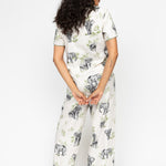 Back view of the Eloise PJ Set, highlighting the relaxed fit, flowing silhouette, and detailing on the cuffs and shaped hem.