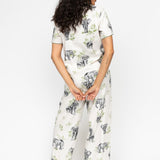 Back view of the Eloise PJ Set, highlighting the relaxed fit, flowing silhouette, and detailing on the cuffs and shaped hem.