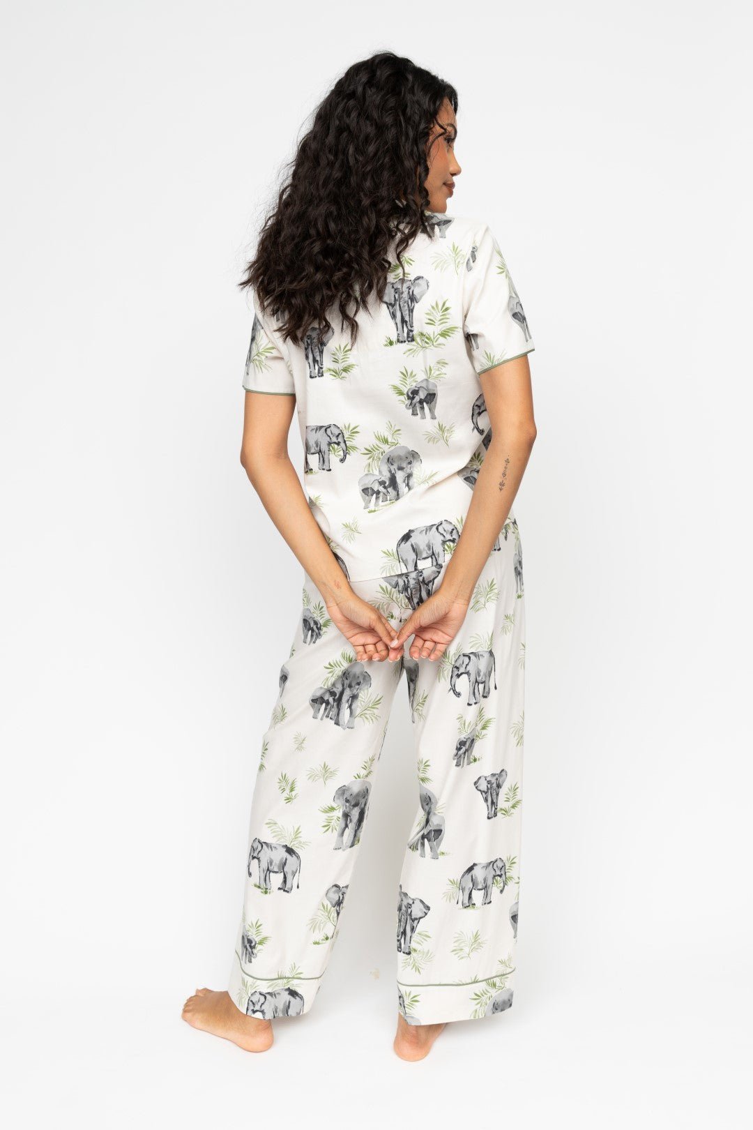 Back view of the Eloise PJ Set, highlighting the relaxed fit, flowing silhouette, and detailing on the cuffs and shaped hem.