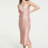 Front view of woman in Bridal Rose silk slip dress, showing fluid drape and bias cut.