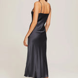 Back view of Ginia Silk Lace Slip in navy, showing bias cut and French seam finish.