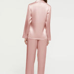 Back view of Ginia Fine Finishes Pyjama in soft pink silk with tailored finish and piping detail.