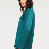 Side view of Ginia Fine Finishes Silk Pyjama in Emerald showing relaxed fit and luxurious sheen.