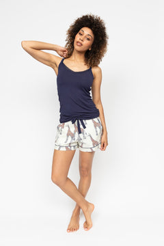 Displaying Cyberjammies Taylor Hidden Support Vest paired with Georgina Giraffe Print Shorts—lace-trim detail and playful print front and centre.