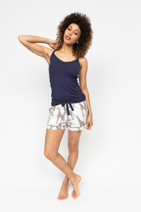 Displaying Cyberjammies Taylor Hidden Support Vest paired with Georgina Giraffe Print Shorts—lace-trim detail and playful print front and centre.
