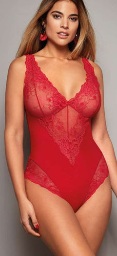 Model wearing Greta IM Lace Bodysuit in Red by Janira, featuring vibrant lace details, plunge neckline, and supportive, flattering fit.