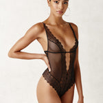 Front view of Geneva Pearl Thong Bodysuit Black by BRACLI featuring fine Italian lace and genuine pearl thong detail.
