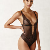 Front view of Geneva Pearl Thong Bodysuit Black by BRACLI featuring fine Italian lace and genuine pearl thong detail.