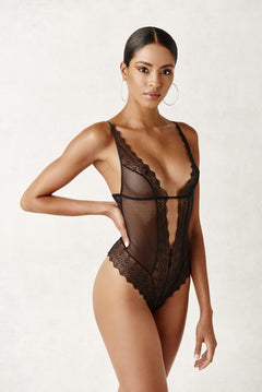 Front view of Geneva Pearl Thong Bodysuit Black by BRACLI featuring fine Italian lace and genuine pearl thong detail.