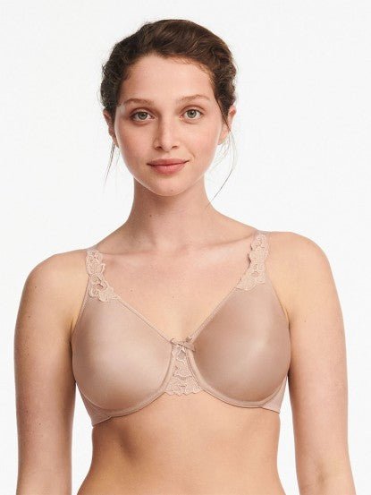 Model in Chantelle Hedona Minimiser Bra Nude, front view showing seamless cups and natural rounded shape, comfort bra from The Foundation.