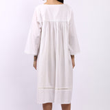 Back view of Lotus Susie 3/4 sleeve white cotton nightdress with lace-trim hemline.