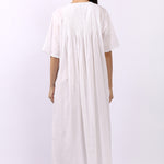 Back view of Lotus Sara short sleeve pintuck nightdress in white cotton fabric.
