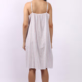 Woman wearing Lotus Frilly Nightie Sky Stripe, sleeveless cotton nightdress with frill detail back view