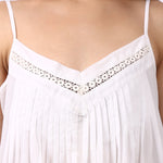 Close-up of lace-trim V-neckline with pintuck detailing on Lotus Susie spaghetti strap cotton nightdress.