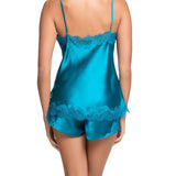 Back view of Scarlett Silk Cami in Jewel Blue, highlighting the lustrous silk fabric and detailed lace trim on the back and hem.