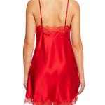 Back view of the Scarlett Silk Chemise in red, featuring detailed lace edging and adjustable straps, model demonstrating elegant silk nightwear.