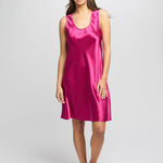 Model wearing cerise Mono Silk Short Nightie with wide straps and softly draped 100% silk fabric falling above the knee.