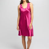 Model wearing cerise Mono Silk Short Nightie with wide straps and softly draped 100% silk fabric falling above the knee.