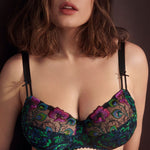 Model in Prima Donna San Angel Full Cup Bra Peacock Feather, showing blue-green and pink lace detail, exclusive to The Foundation.