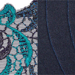 Close-up of intricate embroidery on PrimaDonna Deauville Full Briefs Velvet Blue, focusing on hip design, exclusive to The Foundation.