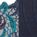 Close-up of intricate embroidery on PrimaDonna Deauville Full Briefs Velvet Blue, focusing on hip design, exclusive to The Foundation.