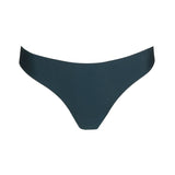 Flat lay of Tom Mini Thong Brief in dark emerald green, featuring textured fabric and modern design