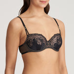 Angle view of model in Junoo Padded Balcony Bra Black from The Foundation, showing feminine fit and full, sexy cleavage