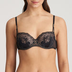 Straight-on model shot of Junoo Padded Balcony Bra Black from The Foundation, showing how the balcony shape sits perfectly under tops or dresses
