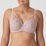 Model wearing PrimaDonna Sophora Full Cup Bra Bois De Rose, front view showing soft pink lace and full coverage fit, luxury lingerie from The Foundation.