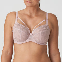 Model wearing PrimaDonna Sophora Full Cup Bra Bois De Rose, front view showing soft pink lace and full coverage fit, luxury lingerie from The Foundation.