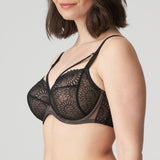 Side profile of PrimaDonna Sophora Full Cup Bra Black on model, showing flattering lift and soft mesh details, available at The Foundation.