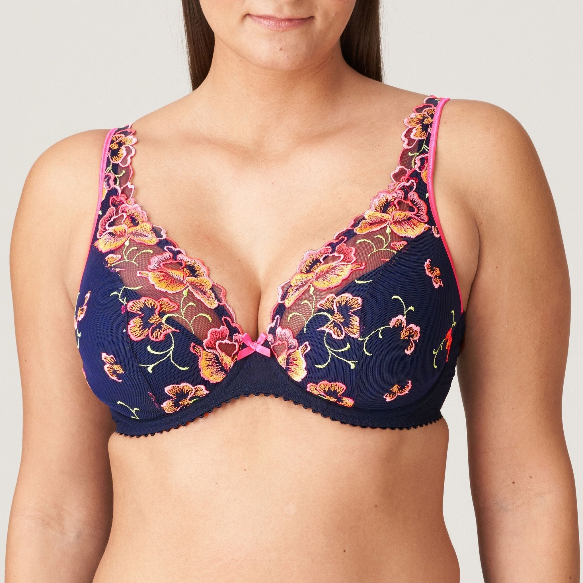 PrimaDonna Devdaha Plunge Bra Velvet Blue – close-up of neon pink nasturtium embroidery on dark blue base.