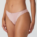 Side angle of model in Jane Italian Brief Bois De Rose from The Foundation, highlighting delicate embroidery on the legs and a flattering fit
