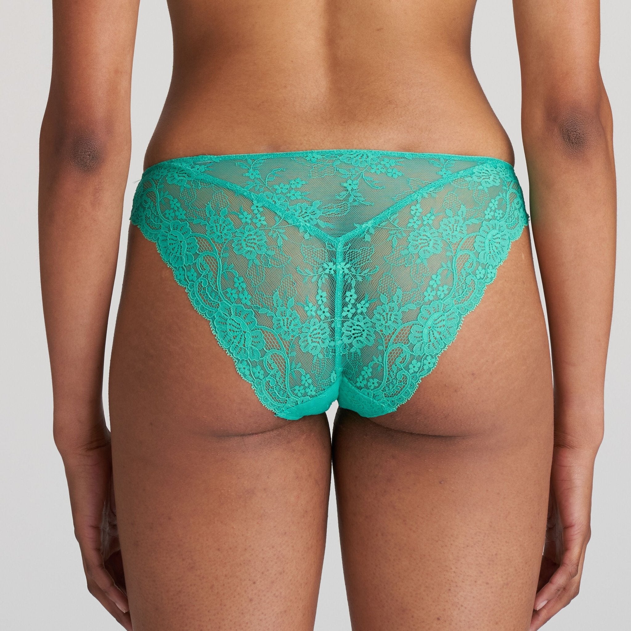 Back view of the Vivid Green Melipha Rio Brief with near-full coverage and a delicate lace finish.