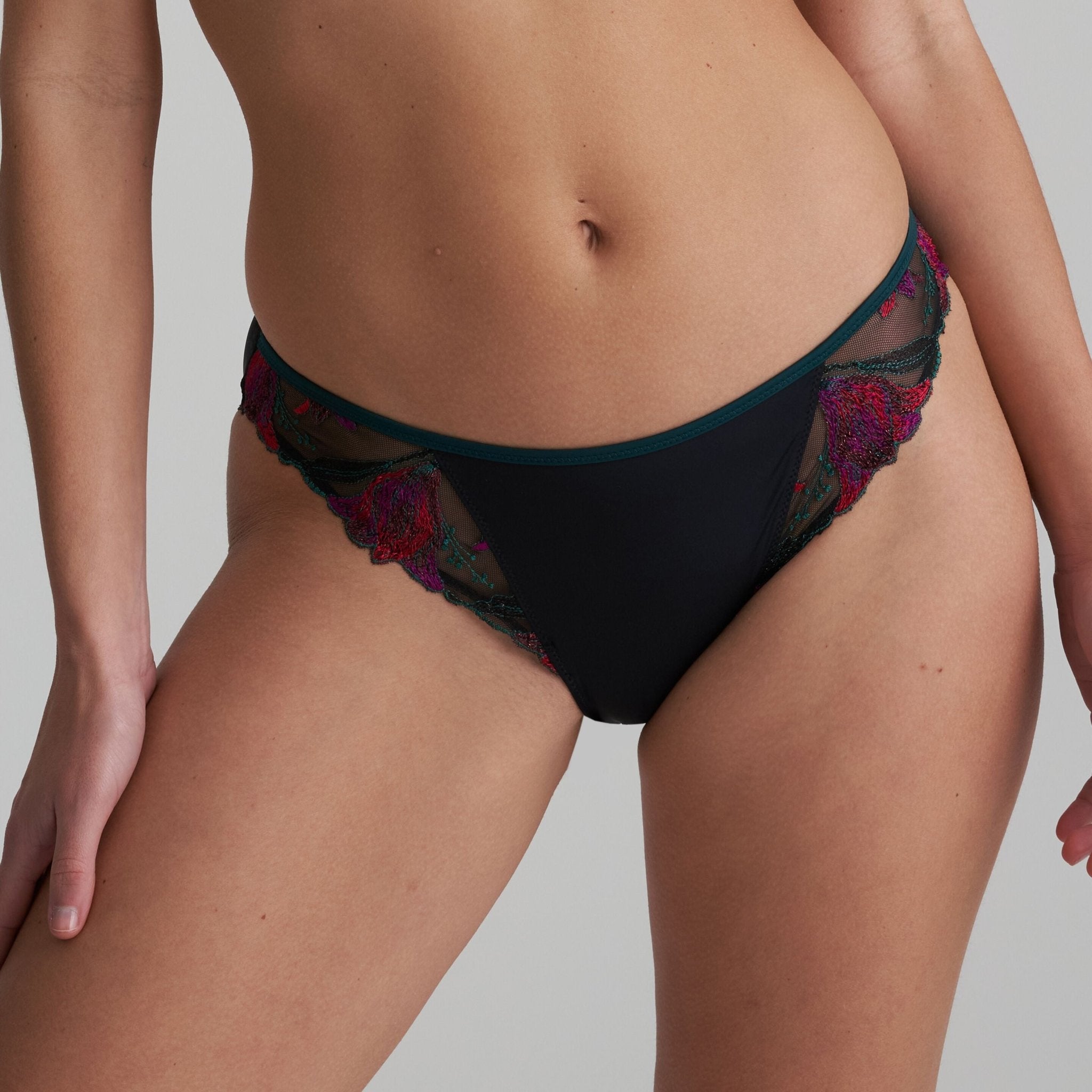 Marie Jo Yoly Rio Brief in Jewel Green with shimmery fabric and floral embroidery, featuring a broader back band for a smooth fit.