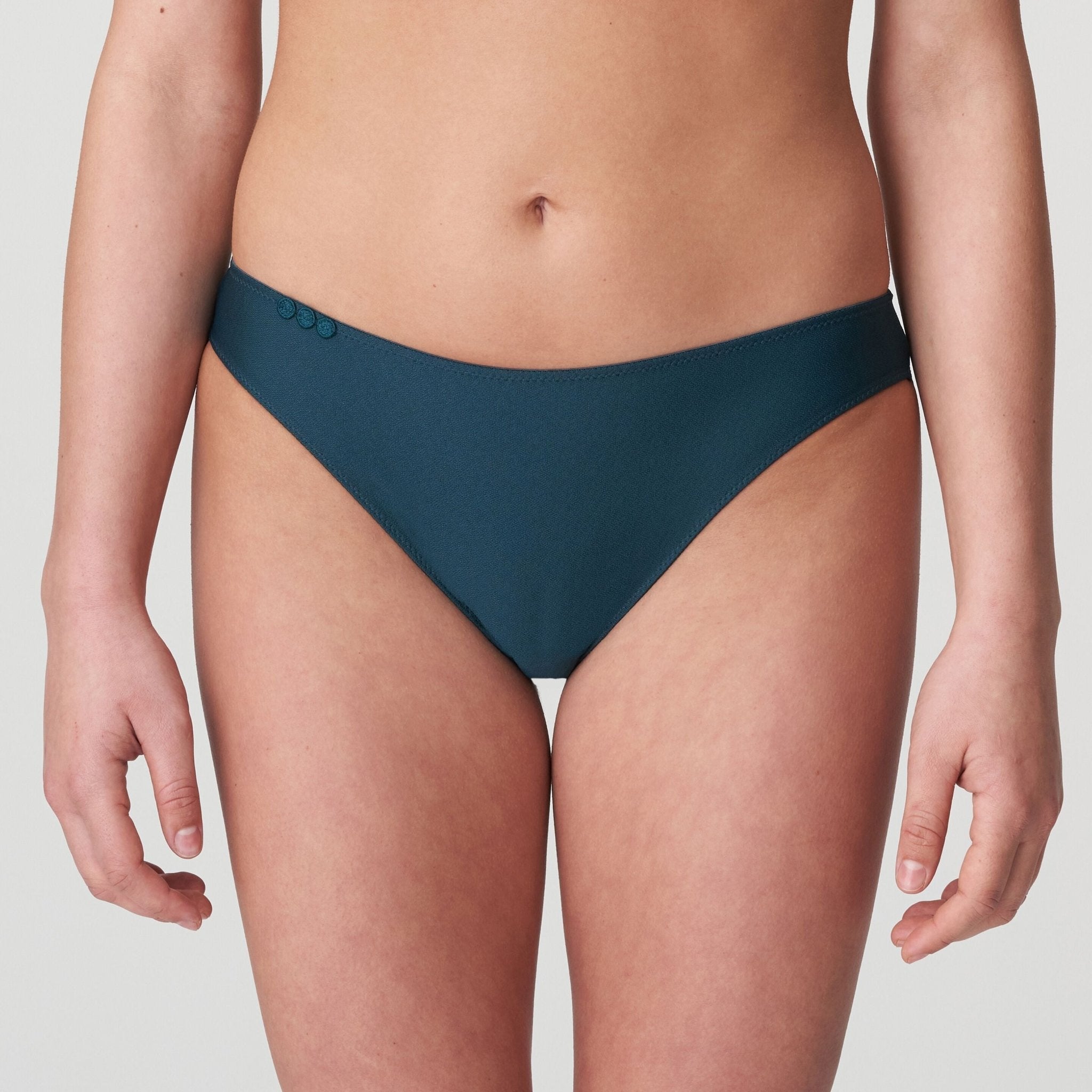 Front view of Marie Jo Tom Mini Rio Brief in Emerald Green showing mid-rise bikini coverage and signature circle detailing