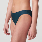 Side angle of Tom Mini Rio Brief in Emerald Green, highlighting sleek fit and modern hip detail